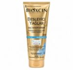 کرم مراقبت و تغذیه مو بیوکسین حاوی 9 روغن گل و ویتامین B5  - مناسب موهای خشک و آسیب دیده - 250 میلی لیتر